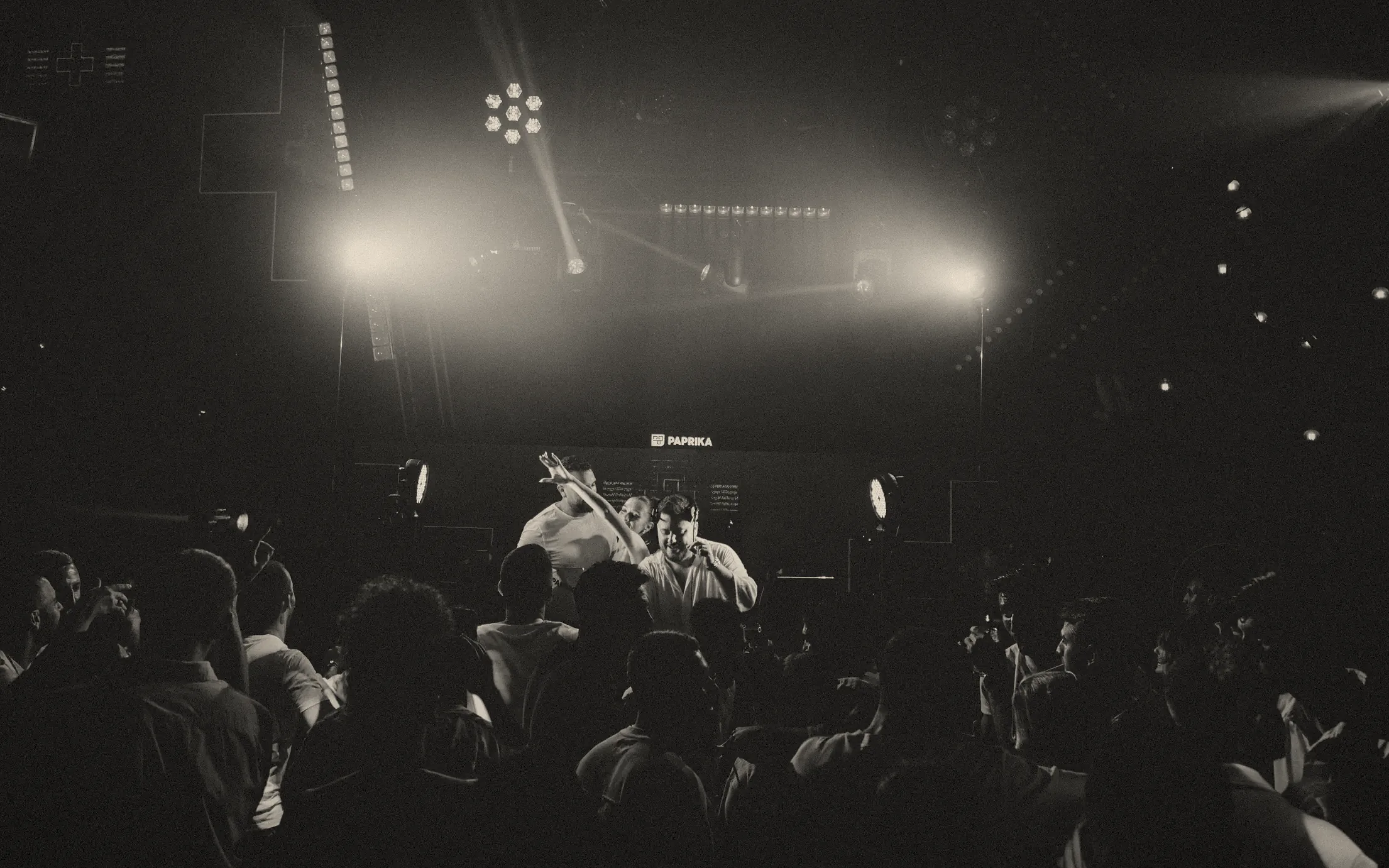 Dor Gal performing on stage in front of a crowd